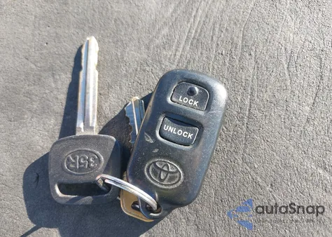 2000 Toyota Camry Le z USA, uszkodzony, nr VIN JT2BG22K7Y0519484